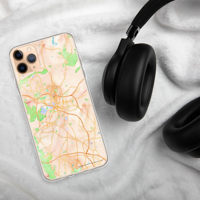 Custom Durham North Carolina Map Phone Case in Watercolor on Table with Black Headphones