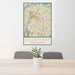 24x36 Durham North Carolina Map Print Portrait Orientation in Woodblock Style Behind 2 Chairs Table and Potted Plant