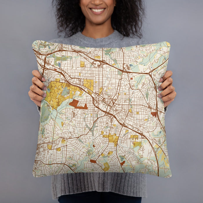 Person holding 18x18 Custom Durham North Carolina Map Throw Pillow in Woodblock