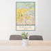 24x36 Eagle Idaho Map Print Portrait Orientation in Woodblock Style Behind 2 Chairs Table and Potted Plant