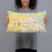 Person holding 20x12 Custom Eagle Idaho Map Throw Pillow in Woodblock