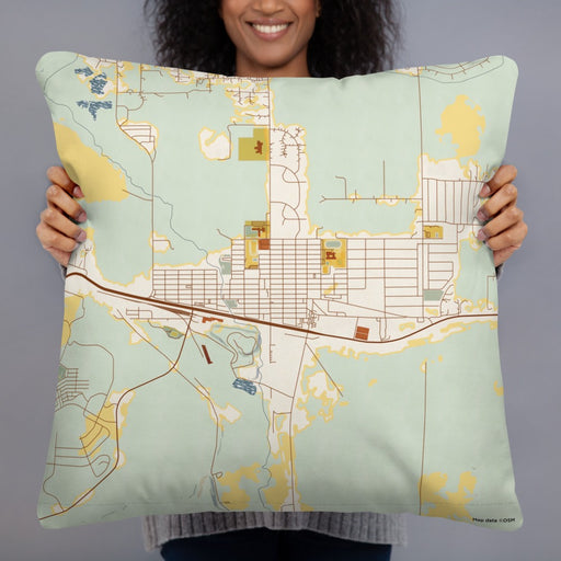 Person holding 22x22 Custom East Helena Montana Map Throw Pillow in Woodblock