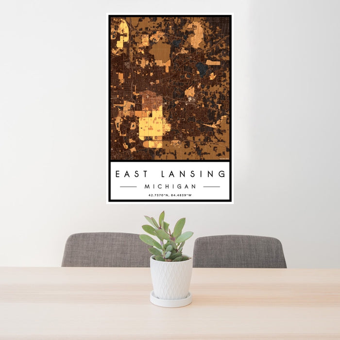 24x36 East Lansing Michigan Map Print Portrait Orientation in Ember Style Behind 2 Chairs Table and Potted Plant
