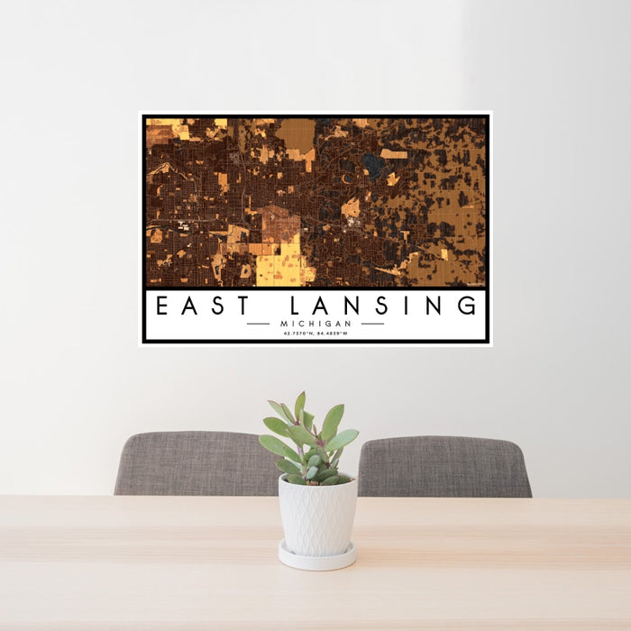 24x36 East Lansing Michigan Map Print Landscape Orientation in Ember Style Behind 2 Chairs Table and Potted Plant