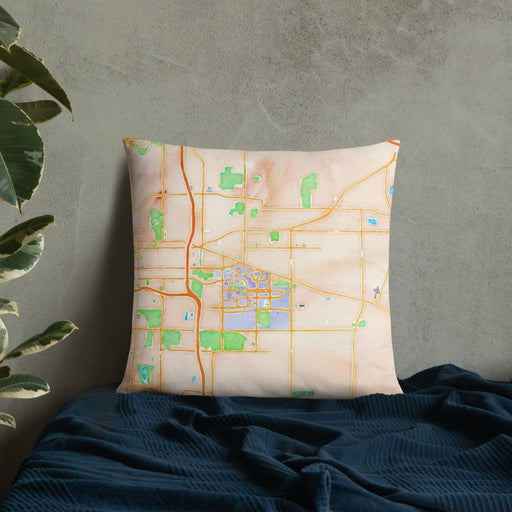 Custom East Lansing Michigan Map Throw Pillow in Watercolor on Bedding Against Wall