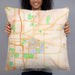 Person holding 22x22 Custom East Lansing Michigan Map Throw Pillow in Watercolor
