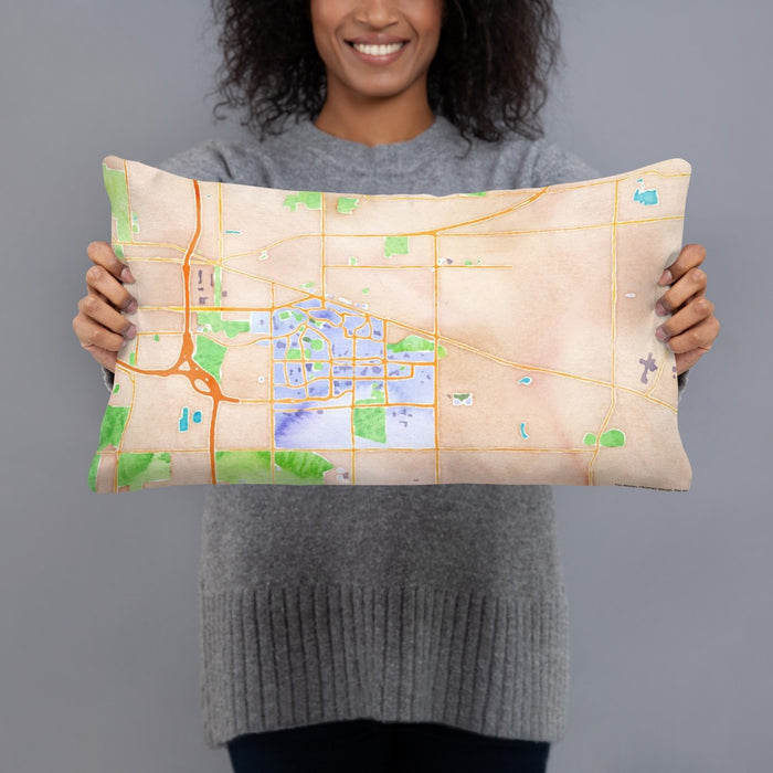 Person holding 20x12 Custom East Lansing Michigan Map Throw Pillow in Watercolor