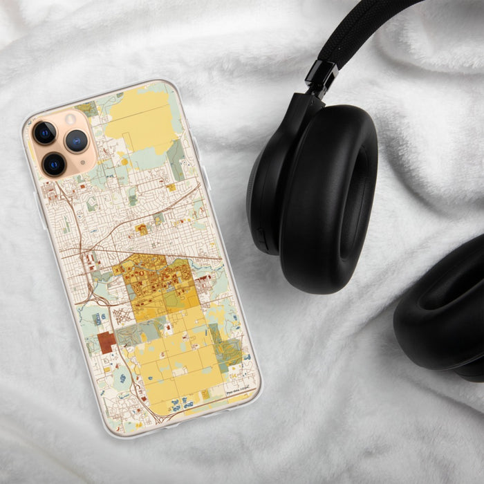 Custom East Lansing Michigan Map Phone Case in Woodblock on Table with Black Headphones