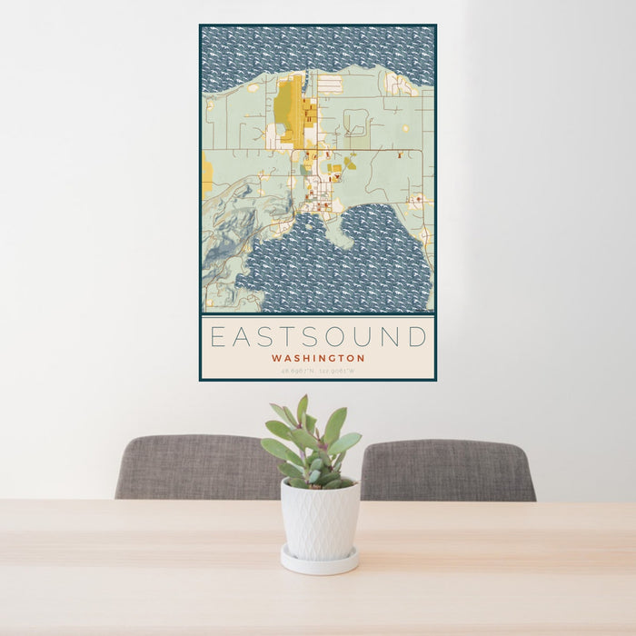 24x36 Eastsound Washington Map Print Portrait Orientation in Woodblock Style Behind 2 Chairs Table and Potted Plant