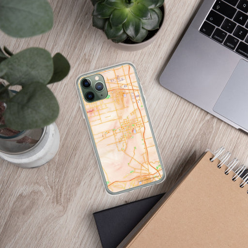 Custom Eastvale California Map Phone Case in Watercolor on Table with Laptop and Plant