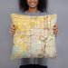Person holding 18x18 Custom Eastvale California Map Throw Pillow in Woodblock