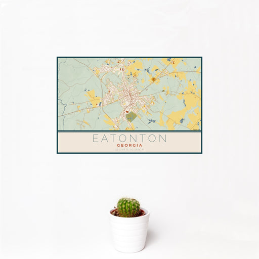 12x18 Eatonton Georgia Map Print Landscape Orientation in Woodblock Style With Small Cactus Plant in White Planter
