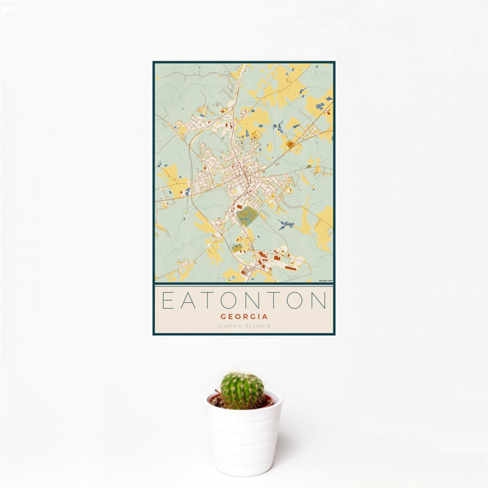 12x18 Eatonton Georgia Map Print Portrait Orientation in Woodblock Style With Small Cactus Plant in White Planter