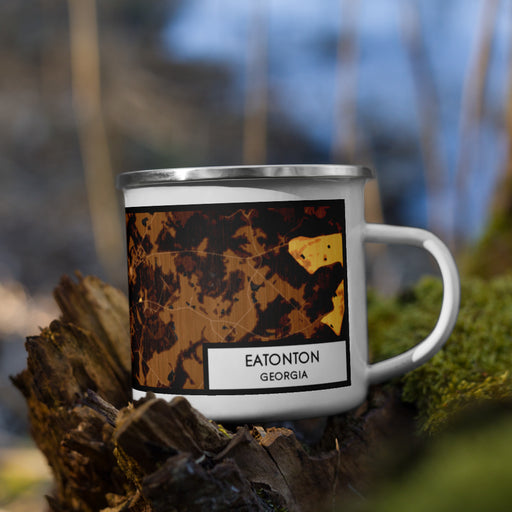 Right View Custom Eatonton Georgia Map Enamel Mug in Ember on Grass With Trees in Background