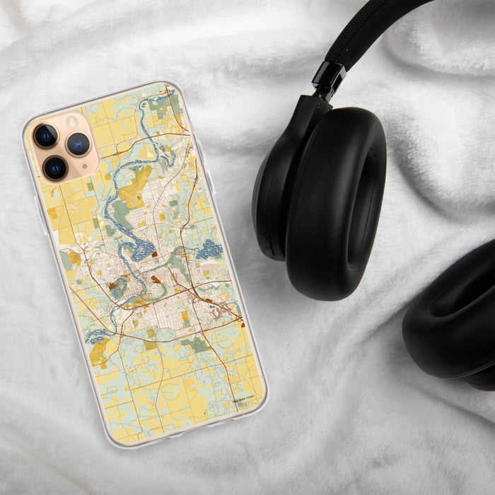 Custom Eau Claire Wisconsin Map Phone Case in Woodblock on Table with Black Headphones