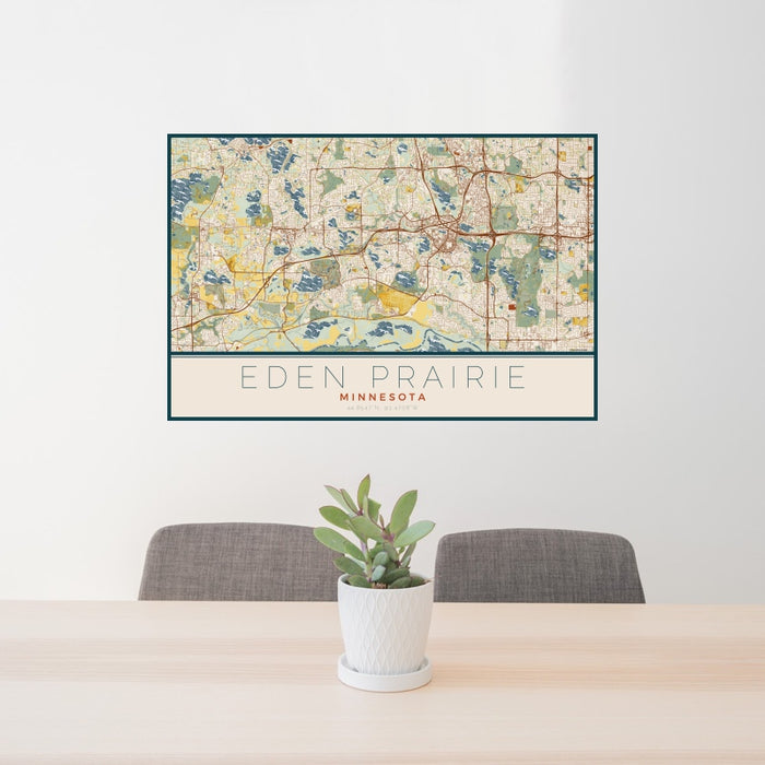 24x36 Eden Prairie Minnesota Map Print Landscape Orientation in Woodblock Style Behind 2 Chairs Table and Potted Plant