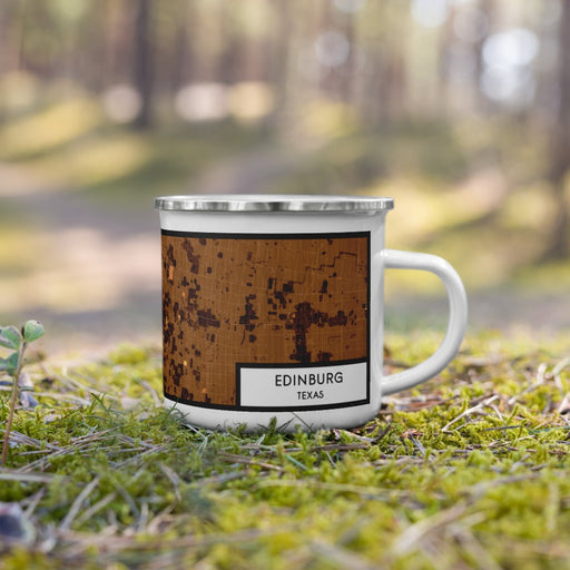 Right View Custom Edinburg Texas Map Enamel Mug in Ember on Grass With Trees in Background