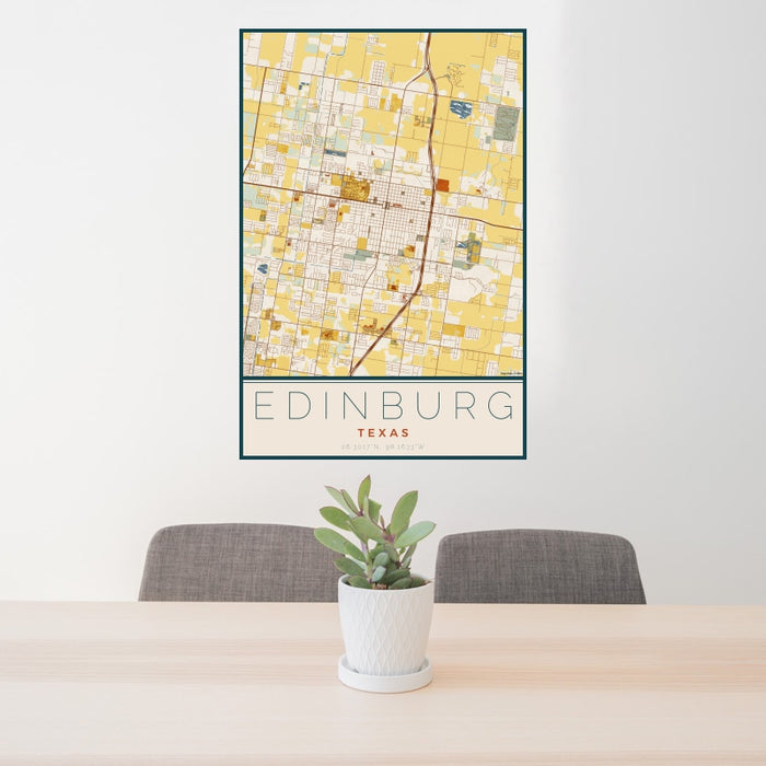 24x36 Edinburg Texas Map Print Portrait Orientation in Woodblock Style Behind 2 Chairs Table and Potted Plant