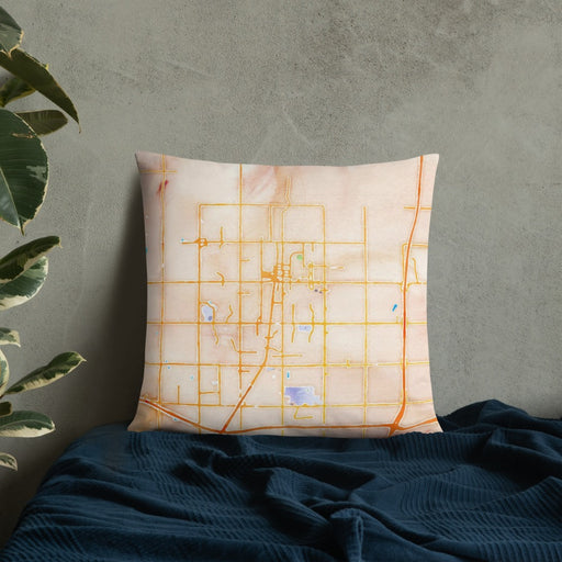 Custom Edmond Oklahoma Map Throw Pillow in Watercolor on Bedding Against Wall