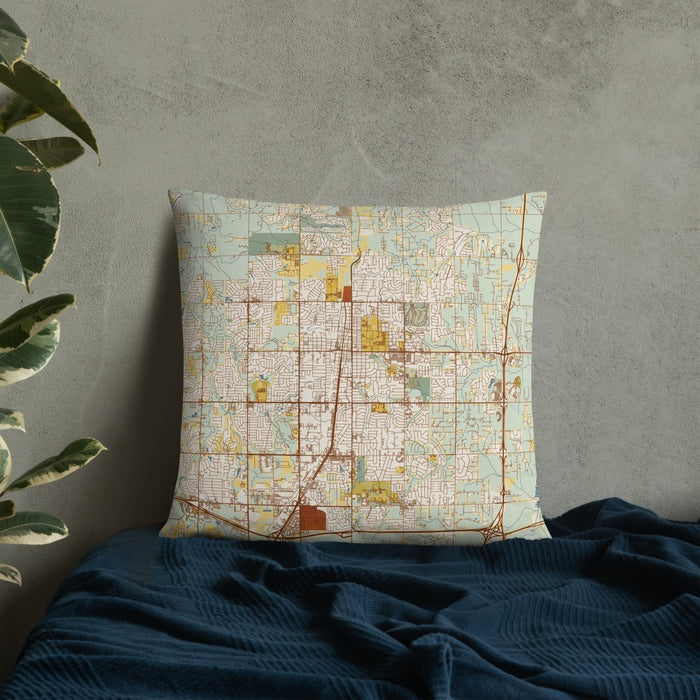 Custom Edmond Oklahoma Map Throw Pillow in Woodblock on Bedding Against Wall