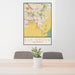 24x36 Elk Grove California Map Print Portrait Orientation in Woodblock Style Behind 2 Chairs Table and Potted Plant