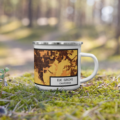 Right View Custom Elk Grove California Map Enamel Mug in Ember on Grass With Trees in Background