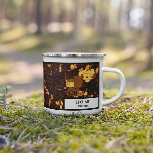 Right View Custom Elkhart Indiana Map Enamel Mug in Ember on Grass With Trees in Background