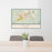 24x36 Elko Nevada Map Print Lanscape Orientation in Woodblock Style Behind 2 Chairs Table and Potted Plant