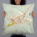 Person holding 22x22 Custom Elko Nevada Map Throw Pillow in Woodblock
