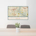 24x36 Ellicott City Maryland Map Print Lanscape Orientation in Woodblock Style Behind 2 Chairs Table and Potted Plant