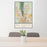24x36 El Paso Texas Map Print Portrait Orientation in Woodblock Style Behind 2 Chairs Table and Potted Plant