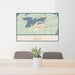 24x36 Ely Minnesota Map Print Lanscape Orientation in Woodblock Style Behind 2 Chairs Table and Potted Plant