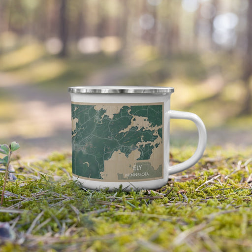 Right View Custom Ely Minnesota Map Enamel Mug in Afternoon on Grass With Trees in Background