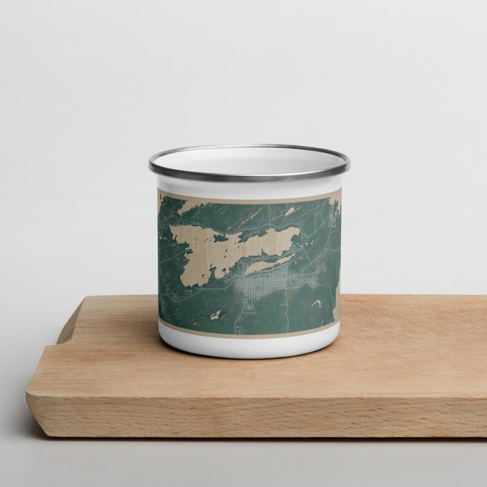 Front View Custom Ely Minnesota Map Enamel Mug in Afternoon on Cutting Board