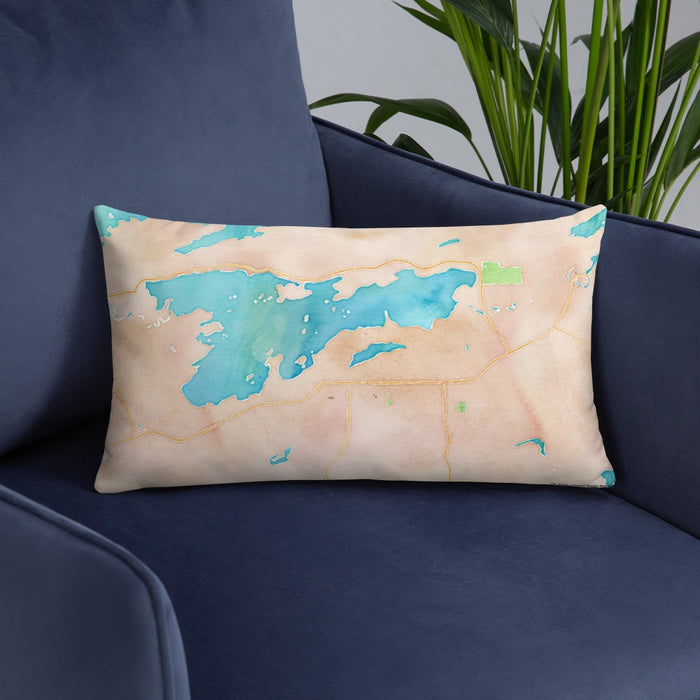 Custom Ely Minnesota Map Throw Pillow in Watercolor on Blue Colored Chair