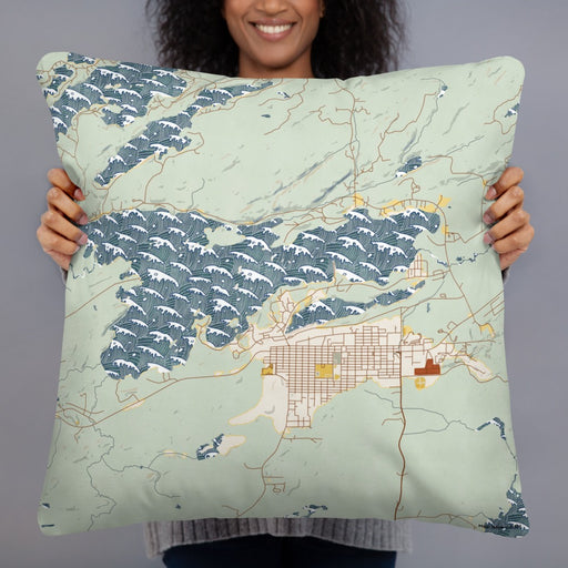 Person holding 22x22 Custom Ely Minnesota Map Throw Pillow in Woodblock
