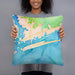 Person holding 18x18 Custom Emerald Isle North Carolina Map Throw Pillow in Watercolor