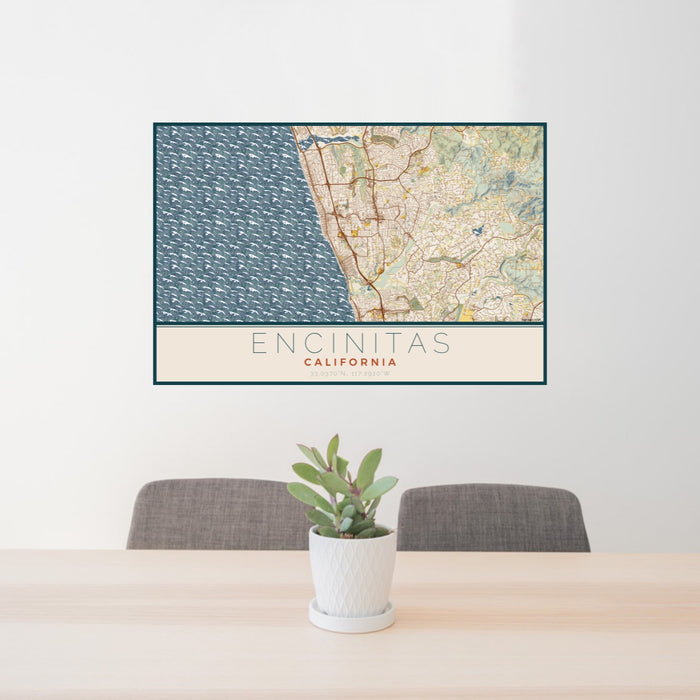 24x36 Encinitas California Map Print Lanscape Orientation in Woodblock Style Behind 2 Chairs Table and Potted Plant
