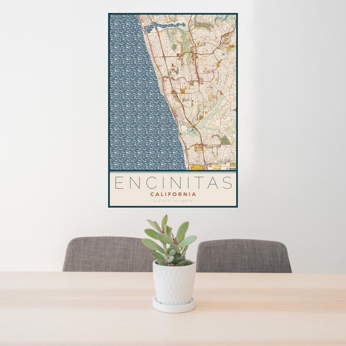 24x36 Encinitas California Map Print Portrait Orientation in Woodblock Style Behind 2 Chairs Table and Potted Plant