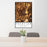 24x36 Enumclaw Washington Map Print Portrait Orientation in Ember Style Behind 2 Chairs Table and Potted Plant