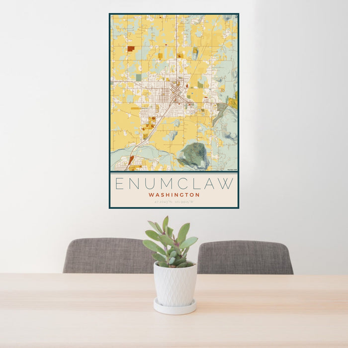 24x36 Enumclaw Washington Map Print Portrait Orientation in Woodblock Style Behind 2 Chairs Table and Potted Plant