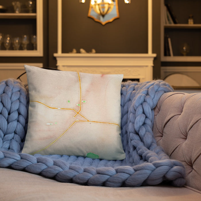 Custom Enumclaw Washington Map Throw Pillow in Watercolor on Cream Colored Couch