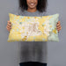 Person holding 20x12 Custom Enumclaw Washington Map Throw Pillow in Woodblock