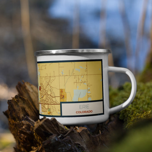 Right View Custom Erie Colorado Map Enamel Mug in Woodblock on Grass With Trees in Background