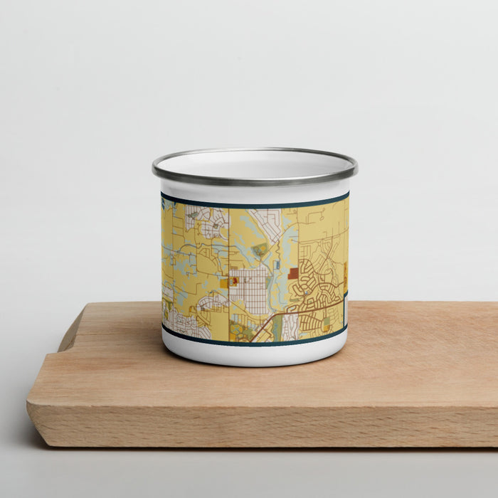 Front View Custom Erie Colorado Map Enamel Mug in Woodblock on Cutting Board