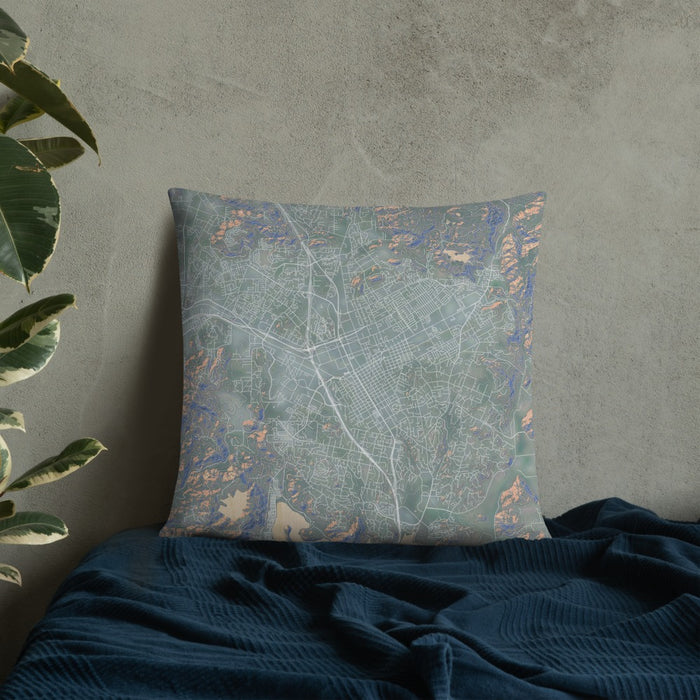 Custom Escondido California Map Throw Pillow in Afternoon on Bedding Against Wall