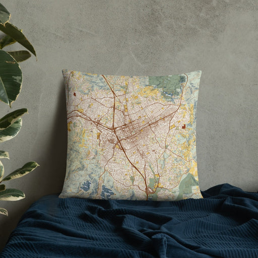 Custom Escondido California Map Throw Pillow in Woodblock on Bedding Against Wall