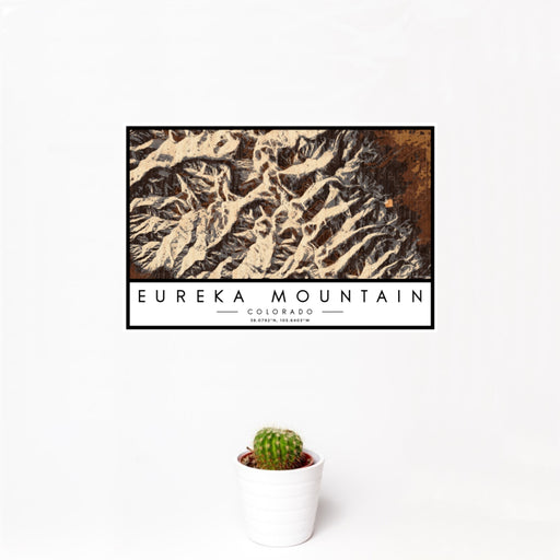 12x18 Eureka Mountain Colorado Map Print Landscape Orientation in Ember Style With Small Cactus Plant in White Planter