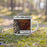 Right View Custom Eureka Mountain Colorado Map Enamel Mug in Ember on Grass With Trees in Background