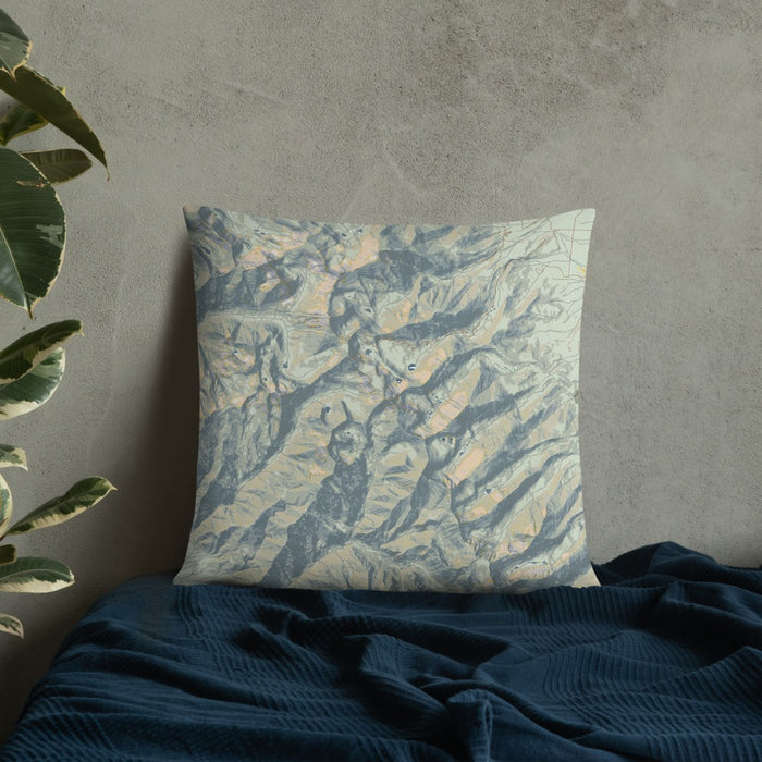 Custom Eureka Mountain Colorado Map Throw Pillow in Woodblock on Bedding Against Wall